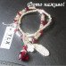 Красный браслет с пером, бусиной, четырехлистником – 5189