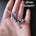 Серебристая брошь Черная ящерица в стразах