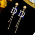 Довгі сережки буква D – 4555