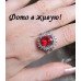Платиновое кольцо с кристаллами Таурия красное