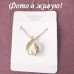 Золотистый комплект Chanel Bella с жемчугом